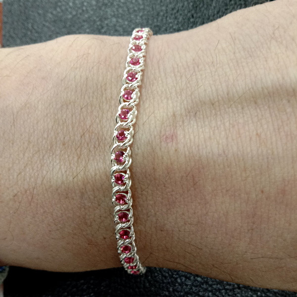 Серебряный женский браслет с камнями рубинового цвета - ASKIDA.RU